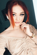 Ukrainian mail order bride Natalia from Warsaw with red hair and green eye color - image 5