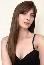 Ukrainian mail order bride Iryna from Luka with light brown hair and blue eye color - image 9