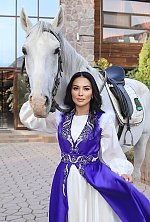 Ukrainian mail order bride Ainura from Astana with brunette hair and hazel eye color - image 4