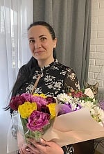 Ukrainian mail order bride Julia from Kiev with black hair and hazel eye color - image 2