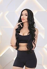Ukrainian mail order bride Anastasia from Kiev with black hair and green eye color - image 2