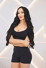 Ukrainian mail order bride Anastasia from Kiev with black hair and green eye color - image 9