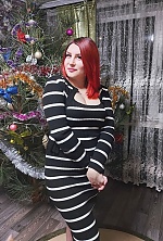 Ukrainian mail order bride Yana from Limansky with red hair and black eye color - image 9