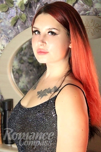 Ukrainian mail order bride Yana from Limansky with red hair and black eye color - image 1