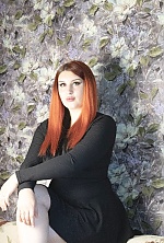 Ukrainian mail order bride Yana from Limansky with red hair and black eye color - image 2