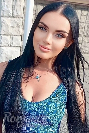 Ukrainian mail order bride Yulia from Kiev with black hair and green eye color - image 1