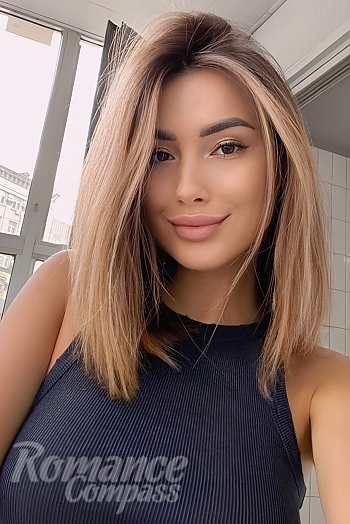 Ukrainian mail order bride Ilona from Kiev with light brown hair and brown eye color - image 1