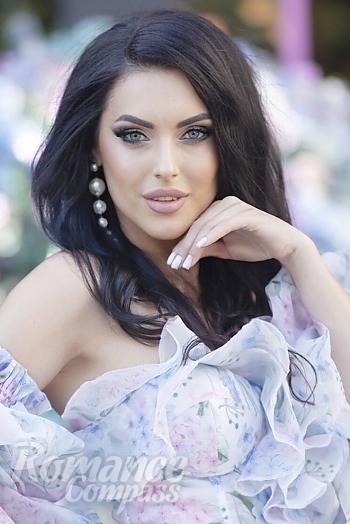 Ukrainian mail order bride Lyuba from Dnepr with black hair and green eye color - image 1
