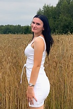 Ukrainian mail order bride Daryna from Prague with black hair and green eye color - image 5
