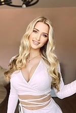 Ukrainian mail order bride Yuliia from Kiev with blonde hair and blue eye color - image 3