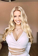 Ukrainian mail order bride Yuliia from Kiev with blonde hair and blue eye color - image 2
