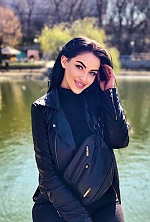 Ukrainian mail order bride Evgenia from Kiev with black hair and green eye color - image 5
