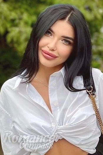 Ukrainian mail order bride Yana from Warsaw with black hair and grey eye color - image 1