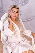 Ukrainian mail order bride Olga from Kyiv with blonde hair and blue eye color - image 11