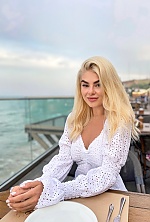 Ukrainian mail order bride Maryana from Kyiv with blonde hair and green eye color - image 8