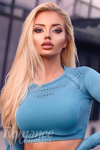 Ukrainian mail order bride Dobrinka from Sofia with blonde hair and hazel eye color - image 1