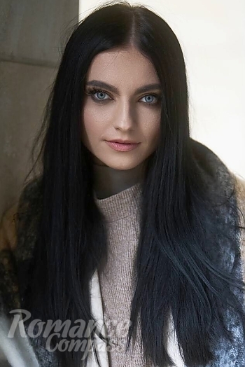 Ukrainian mail order bride Lolita from Chemnitz with black hair and blue eye color - image 1