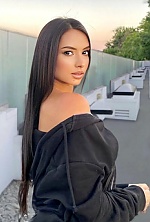 Ukrainian mail order bride Lesia from Kyiv with brunette hair and black eye color - image 9