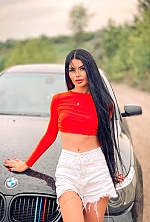 Ukrainian mail order bride Daria from Poltava with black hair and green eye color - image 17