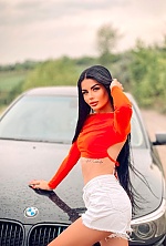 Ukrainian mail order bride Daria from Poltava with black hair and green eye color - image 16