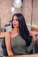 Ukrainian mail order bride Daria from Poltava with black hair and green eye color - image 19