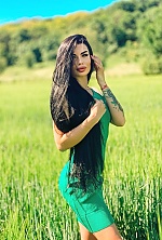Ukrainian mail order bride Daria from Poltava with black hair and green eye color - image 18