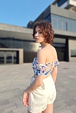 Ukrainian mail order bride Arina from Mykolaiv with red hair and green eye color - image 3