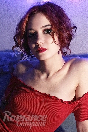 Ukrainian mail order bride Arina from Mykolaiv with red hair and green eye color - image 1