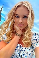 Ukrainian mail order bride Yuliia from San Gwan with blonde hair and grey eye color - image 10
