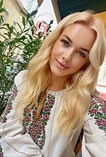 Ukrainian mail order bride Yuliia from San Gwan with blonde hair and grey eye color - image 11