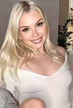 Ukrainian mail order bride Anastasia from Kiev with blonde hair and blue eye color - image 10
