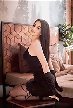 Ukrainian mail order bride Anastasia from Kharkiv with black hair and green eye color - image 5