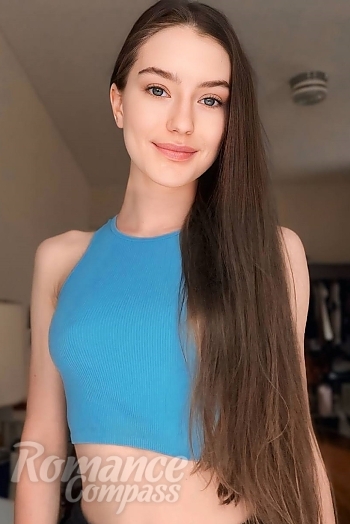 Ukrainian mail order bride Polina from New York with light brown hair and grey eye color - image 1