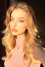 Ukrainian mail order bride Tanya from Minsk with blonde hair and green eye color - image 14
