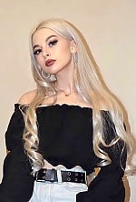 Ukrainian mail order bride Tanya from Minsk with blonde hair and green eye color - image 2