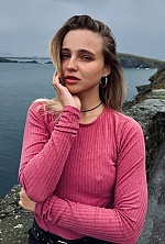 Ukrainian mail order bride Vlada from Kharkiv with light brown hair and green eye color - image 16