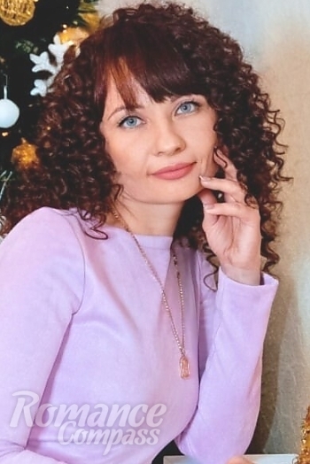 Ukrainian mail order bride Natalya from Mirgorod with brunette hair and blue eye color - image 1