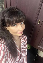 Ukrainian mail order bride Natalya from Myrhorod with brunette hair and blue eye color - image 15