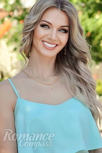 Ukrainian mail order bride Olena from Odessa with blonde hair and green eye color - image 1