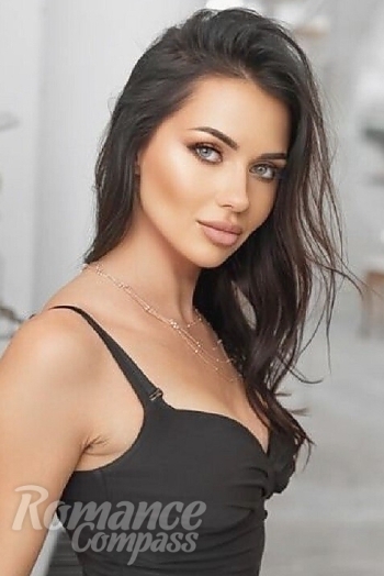 Ukrainian mail order bride Alexandra from Kiev with black hair and blue eye color - image 1