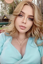 Ukrainian mail order bride Svetlana from Wien with blonde hair and green eye color - image 5