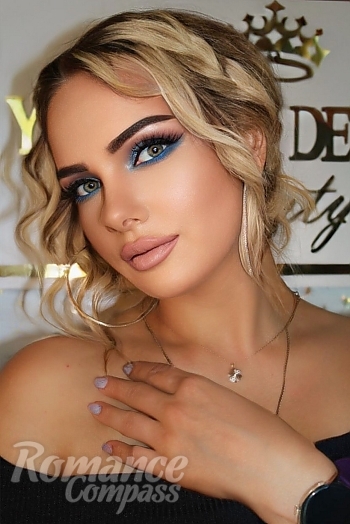 Ukrainian mail order bride Ksyusha from Kharkiv with blonde hair and blue eye color - image 1