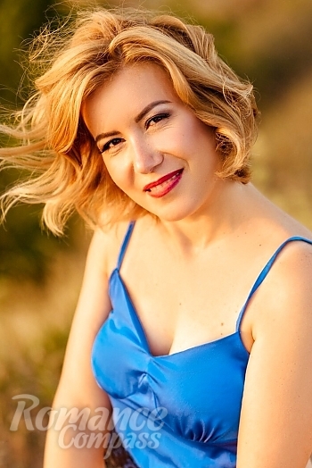 Ukrainian mail order bride Elena from Nikolaev with red hair and brown eye color - image 1