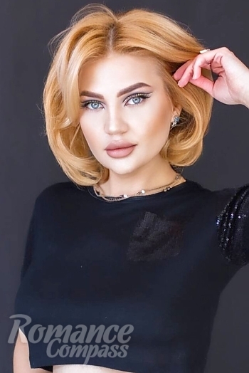 Ukrainian mail order bride Olha from Poltava with blonde hair and grey eye color - image 1
