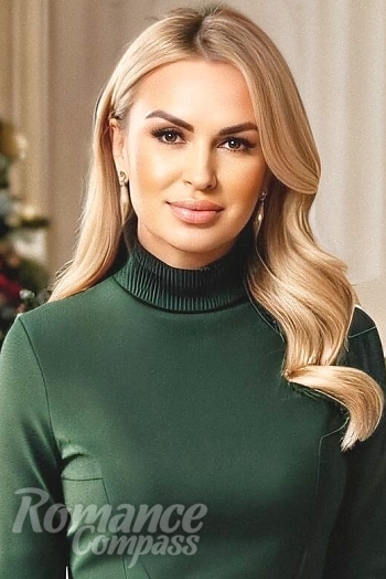 Ukrainian mail order bride Julia from Kiev with blonde hair and brown eye color - image 1