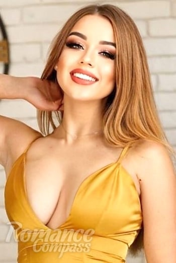 Ukrainian mail order bride Olha from Ivano-Frankivsk with light brown hair and green eye color - image 1