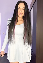 Ukrainian mail order bride Hanna from Kiev with black hair and blue eye color - image 4