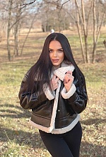 Ukrainian mail order bride Evgenia from Kishinev with black hair and green eye color - image 5