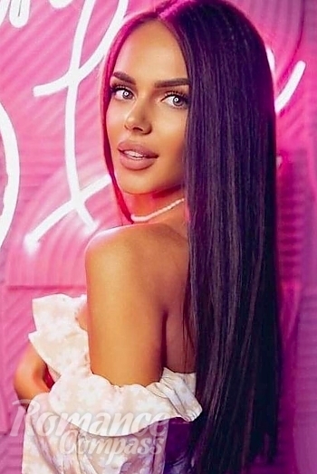 Ukrainian mail order bride Evgenia from Kishinev with black hair and green eye color - image 1