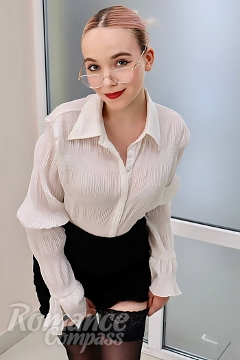 Ukrainian mail order bride Aleksandra from Ivano-Frankivsk with blonde hair and blue eye color - image 1